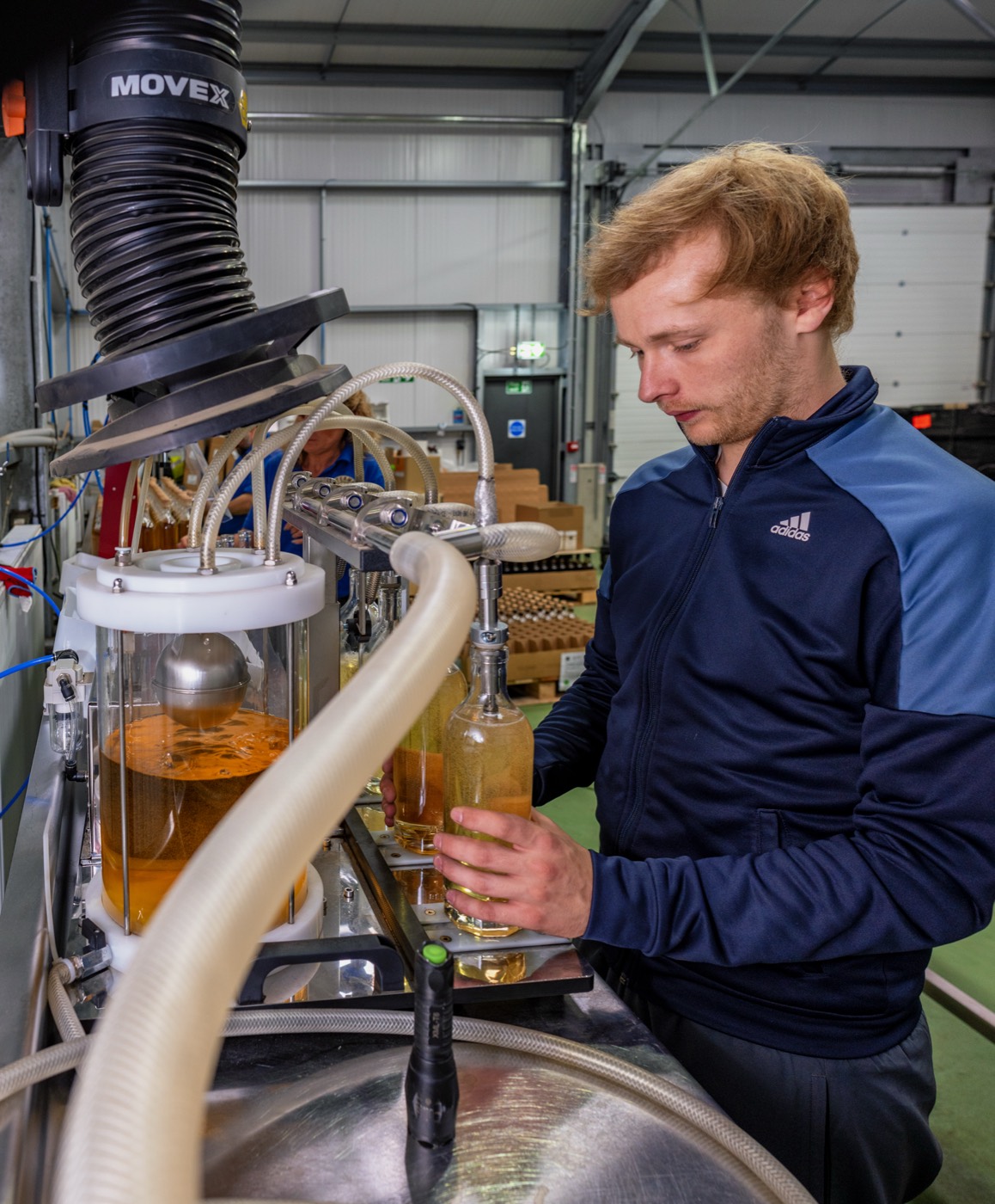 Filling a bottle of whisky on the bottling line at the Glenrothes facility